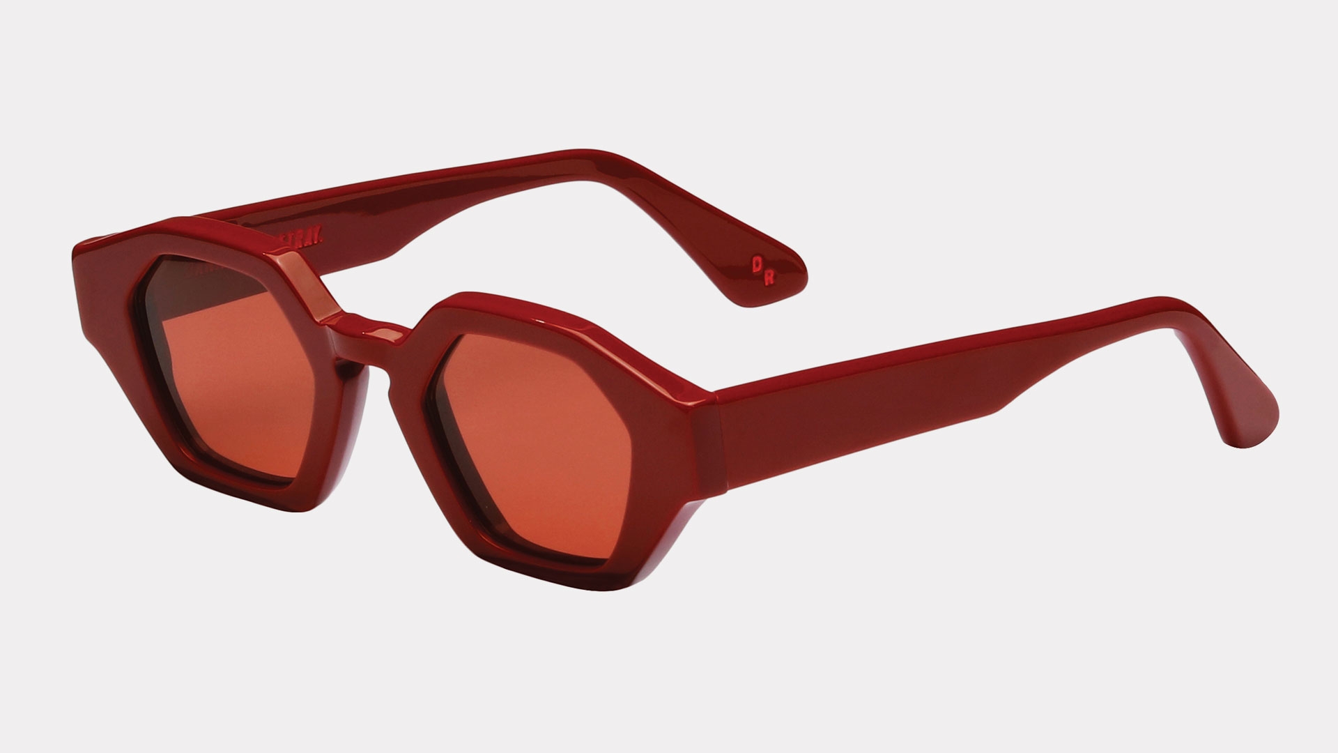 Jean sunglasses in hand polished tartan red with cherry polarised lenses